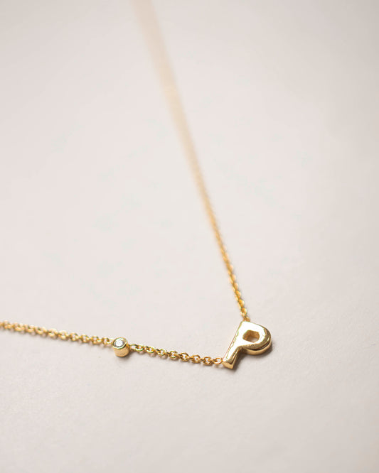 TILTED INITIAL DOT NECKLACE