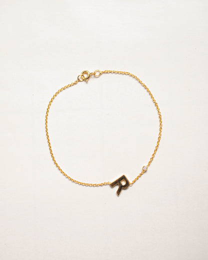 TILTED INITIAL DOT BRACELET