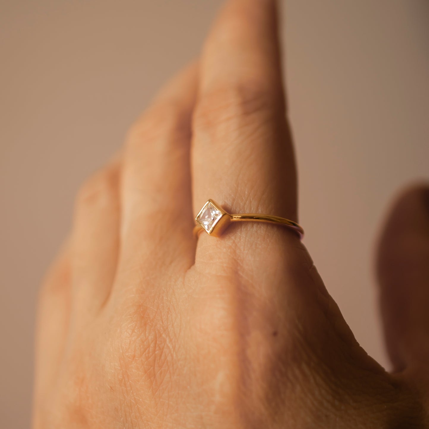 KITE PRINCESS BEZEL SOLITAIRE GOLD RING